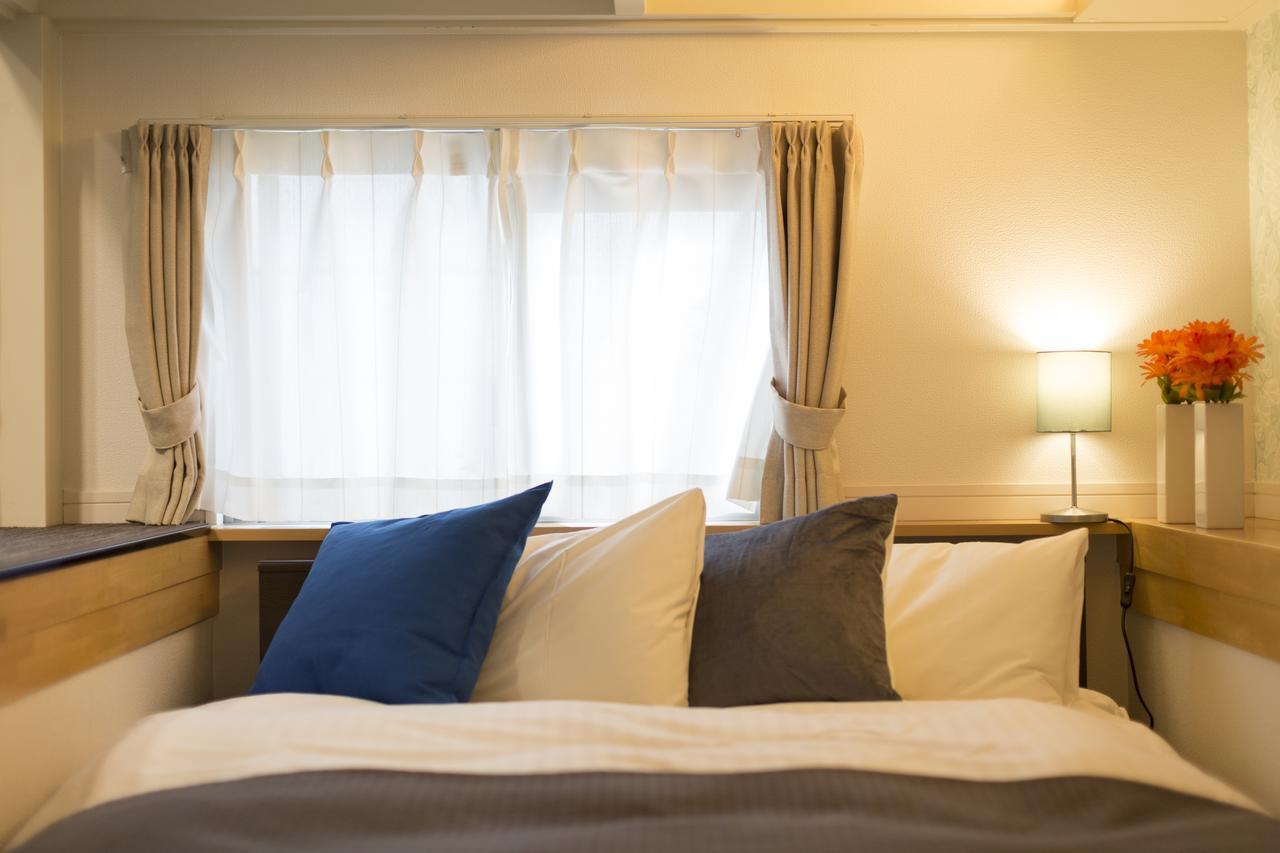 The Metropolitan Aparthotel Фукуока Екстериор снимка